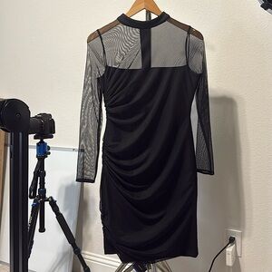 Size 8. Black color. Calvin Klein dress